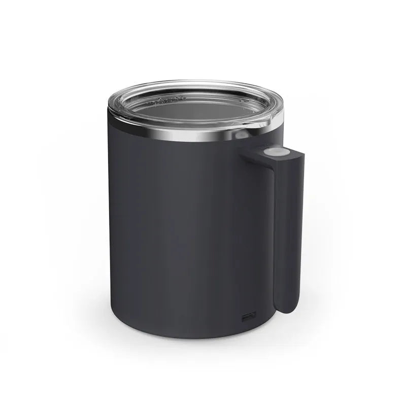 White automatic stirring coffee cup with magnetic base on a wooden table, showing simple solid-colour design.