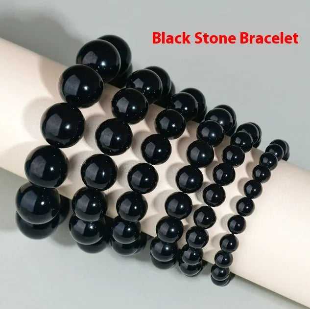 Hand-woven obsidian crystal bracelet showing round beads with ethnic styling in multiple colour options