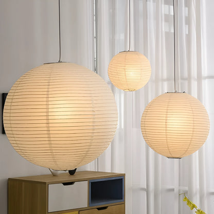 Modern simplicity style paper pendant lamp with spherical or flat disc shade options.