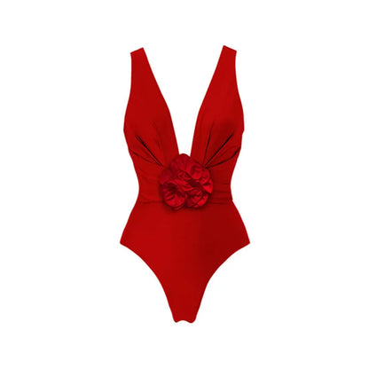 Red women's V-neck halter swimsuit with open back and a matching detachable long skirt laid flat.