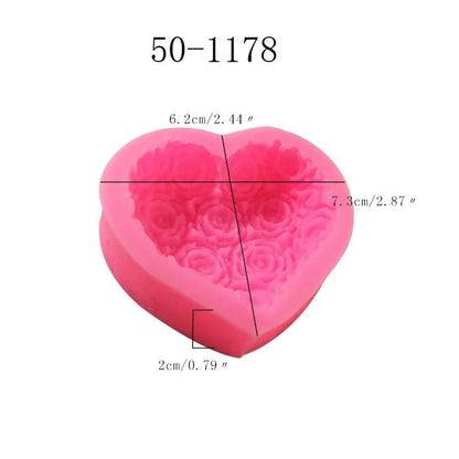 Pink silicone heart-shaped mould with a love design for Valentine's Day crafting.