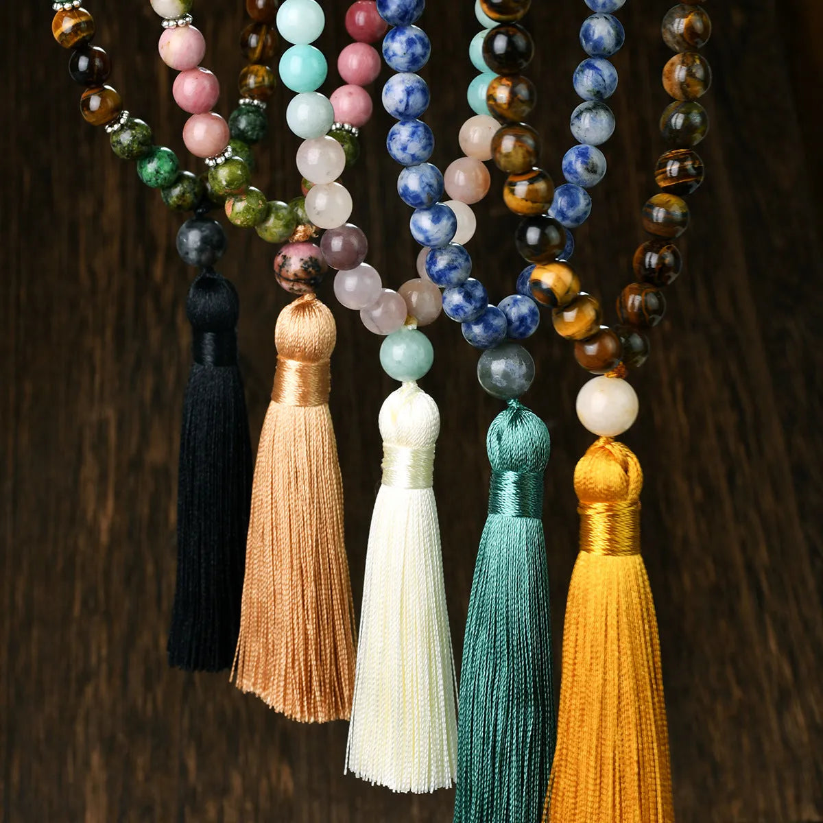 Handmade long necklace with geometric gemstone pendant and tassel on a ball bead chain