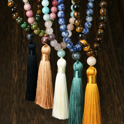 Handmade long necklace with geometric gemstone pendant and tassel on a ball bead chain