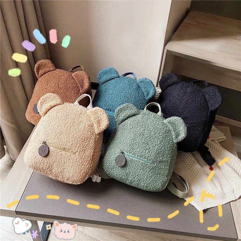 Adorable bear-shaped backpack made of soft, fleece material for kids and women's travel and everyday use