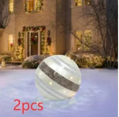 Large 60cm inflatable PVC Christmas decoration ball in bright colours for outdoor garden or tree display.