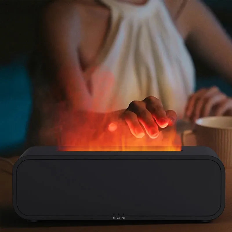 Black and white USB aroma diffuser with remote control showing flame dynamic and colour-changing light effects.