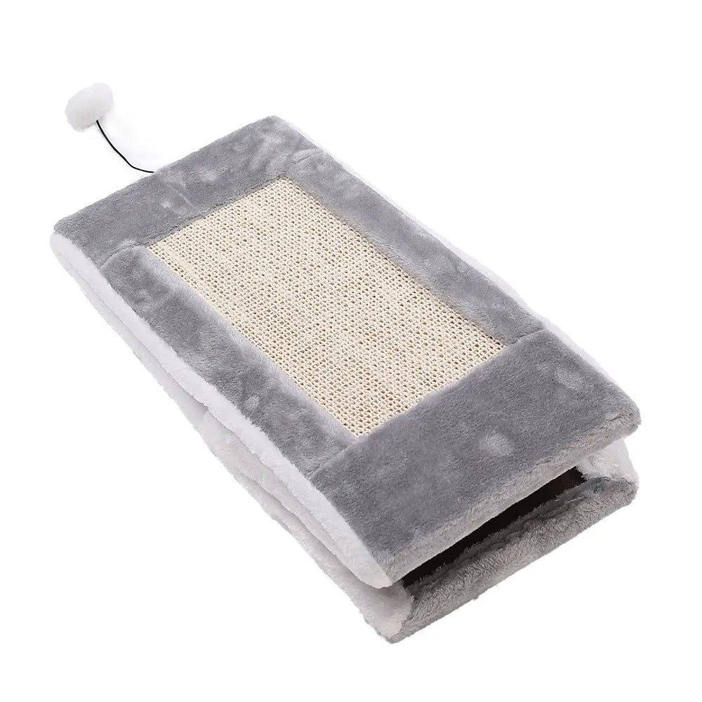 Grey and white triangle-shaped cat scratching post with an integrated soft cat bed.