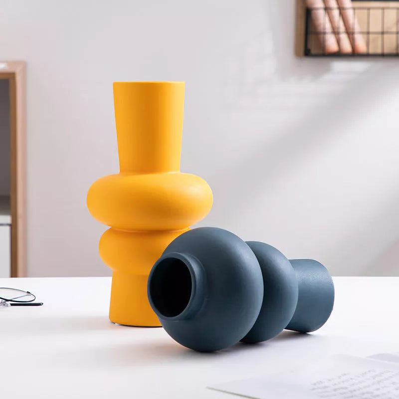 Nordic minimalist ceramic vase with glazed finish in blue, yellow, and orange options