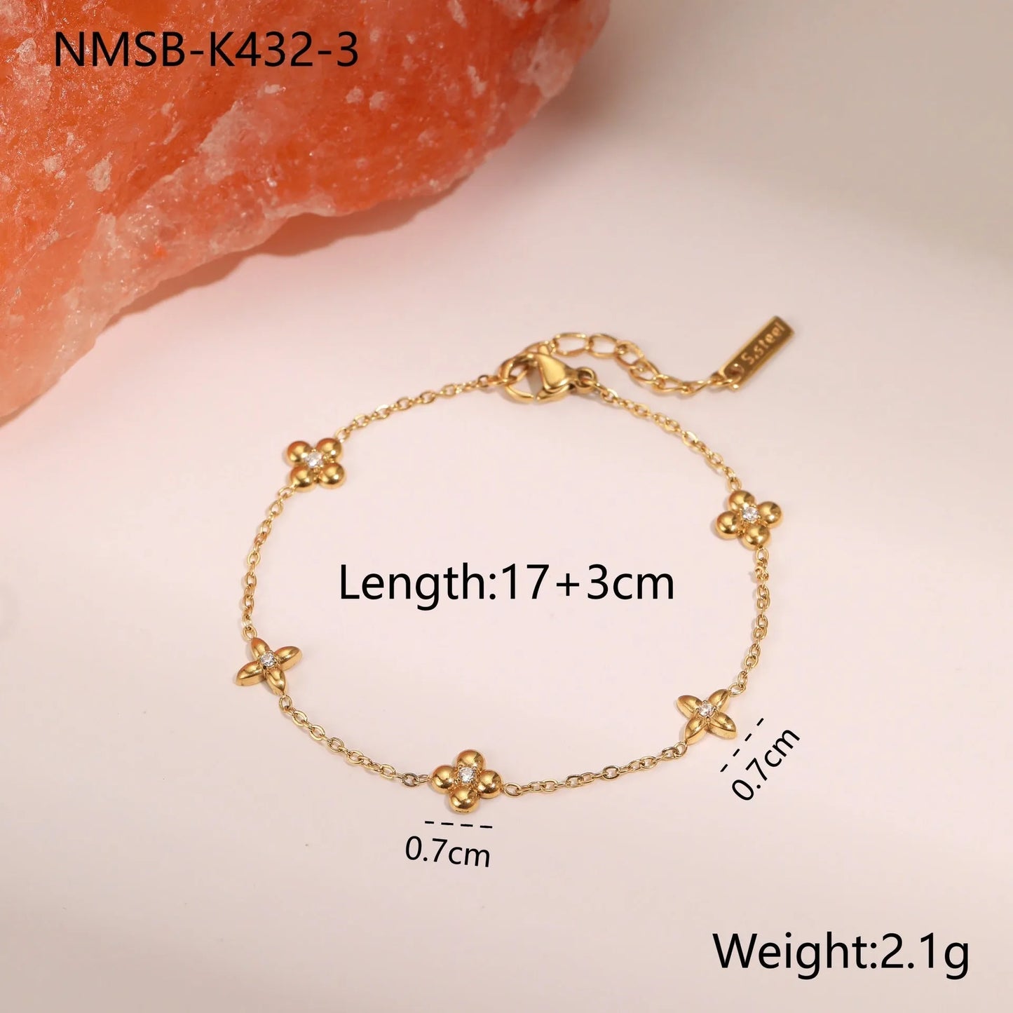 Titanium steel women's bracelet with hexagonal star pendant and 18K gold plating