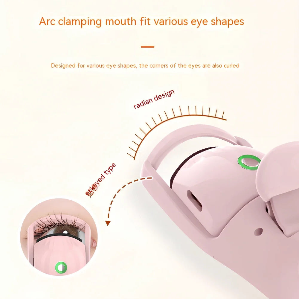 Pink and white electric eyelash curler with USB charging cable and temperature control settings