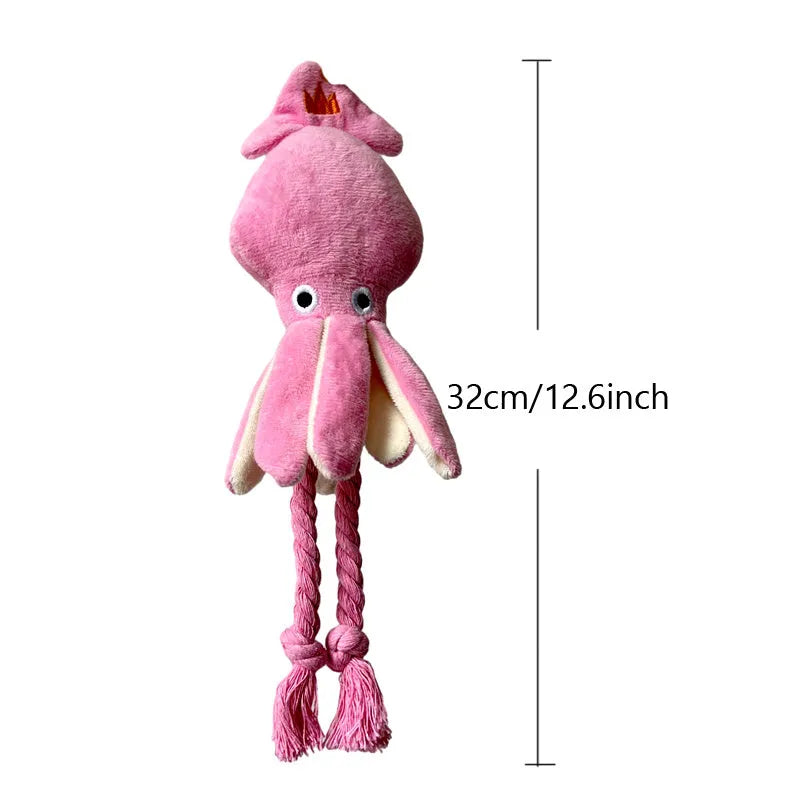 Pink squid-shaped corduroy plush dog toy with a squeaker.