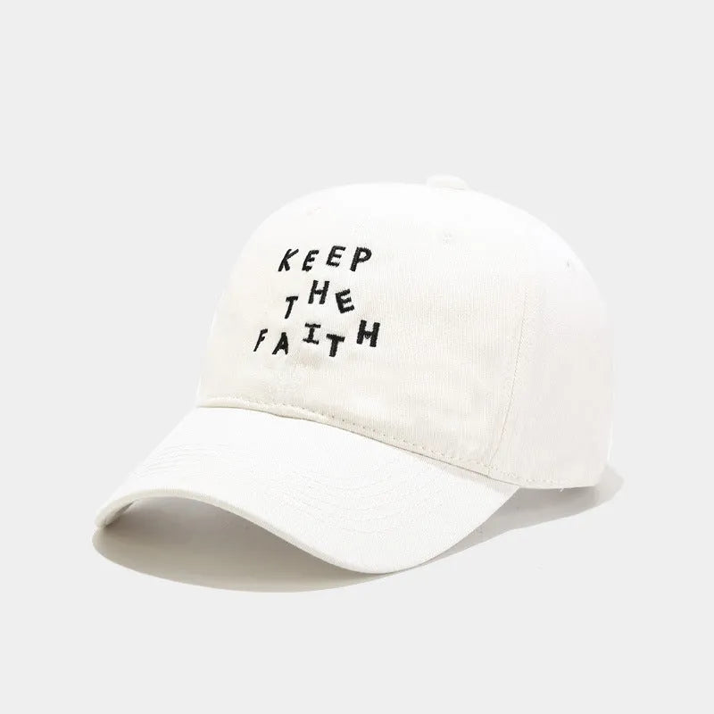 Men's cotton baseball cap with small embroidered letters on front in adjustable dome design