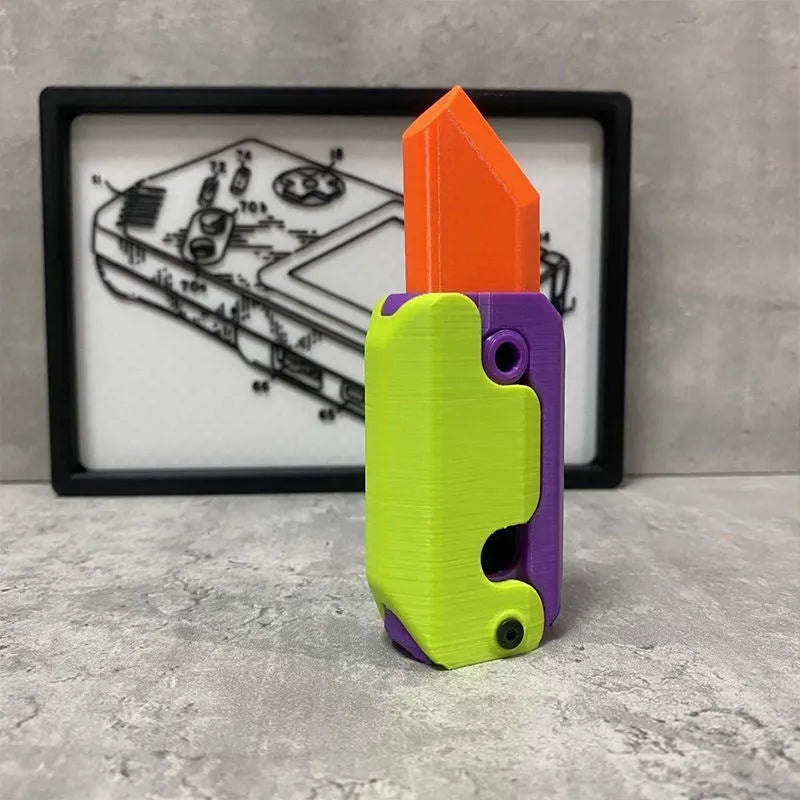 3D printed plastic carrot fidget knife with retractable blade, shown in orange and green colour scheme.