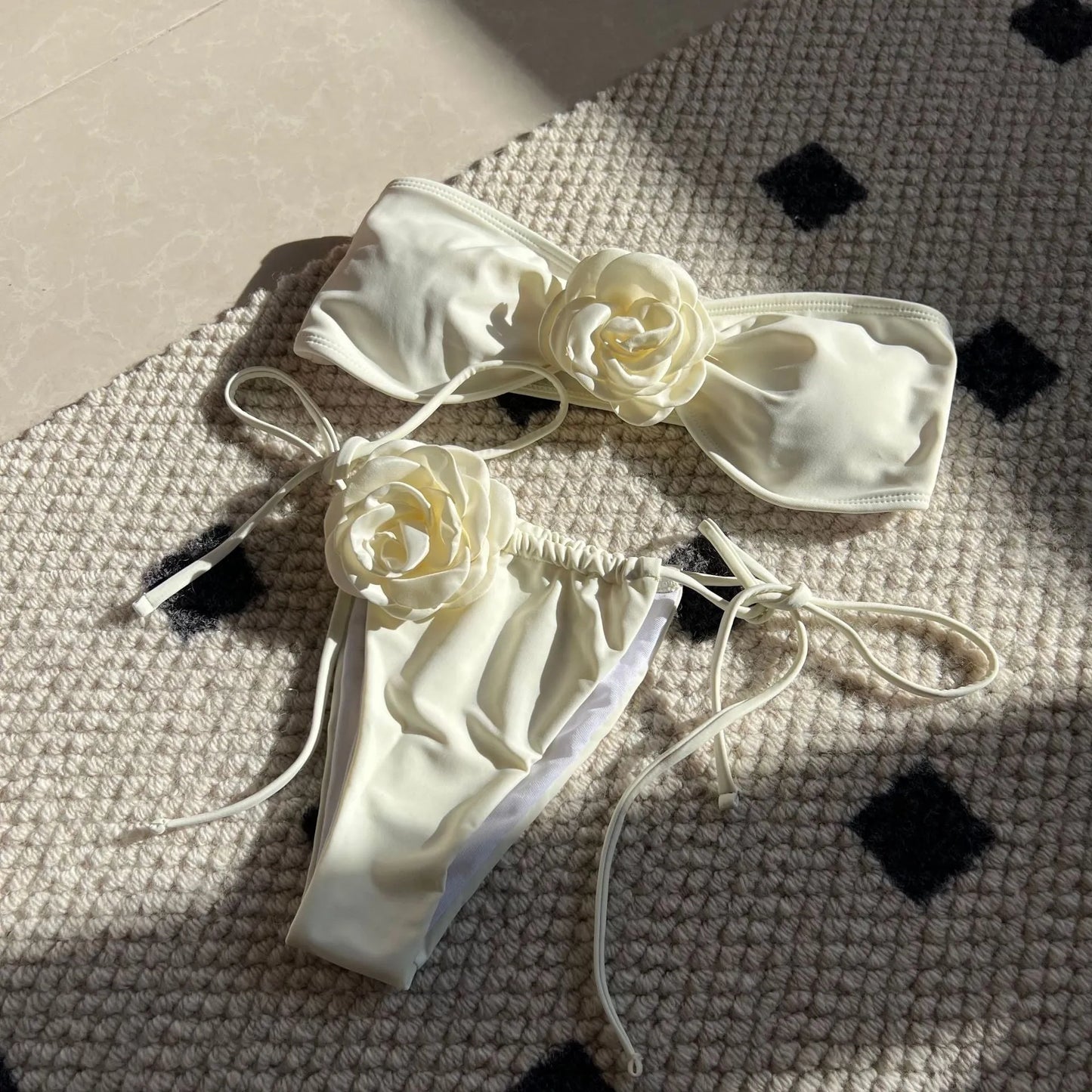 Women's solid colour drawstring tube top swimsuit in brief style, shown in one of nine available colours.