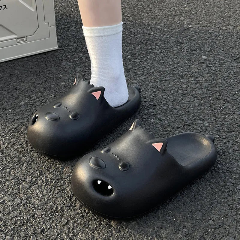 Women's black and white EVA toe-cap slippers shown in sizes 36 to 45.