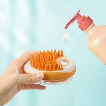 2-in-1 pet grooming brush with soft silicone bristles, shampoo reservoir, and ergonomic grip for bathing and massaging cats and dogs