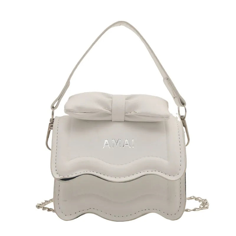 Mini crossbody women's bag in seven colour options with single shoulder strap