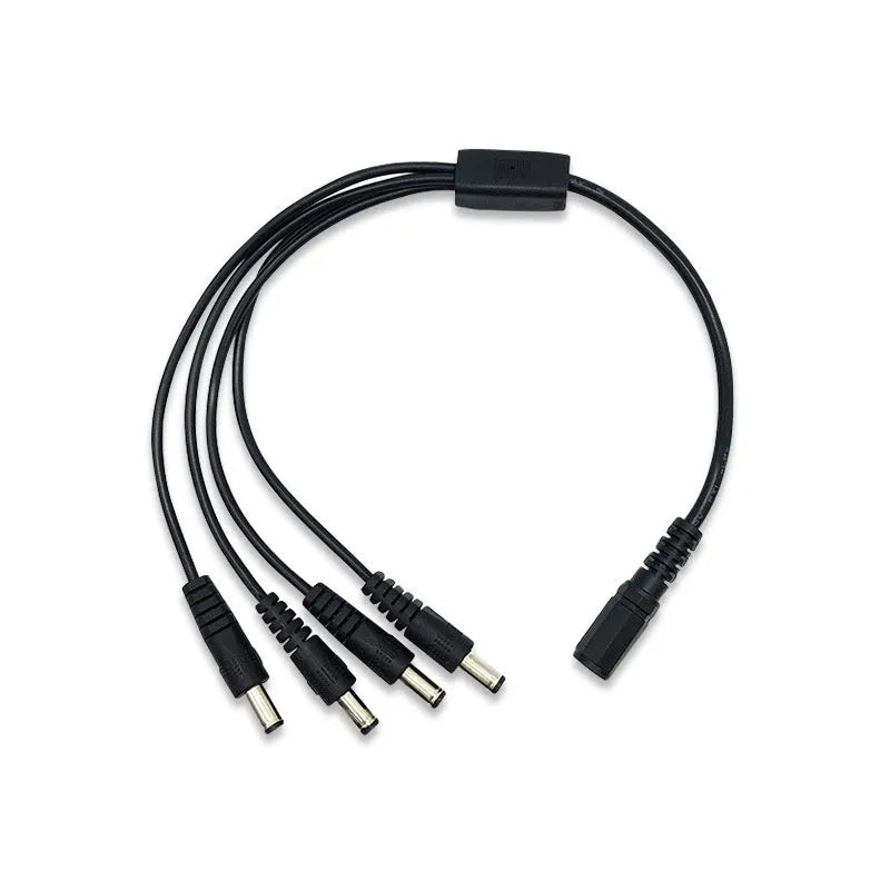 Black DC monitoring power splitter cable with four output connectors for security camera systems