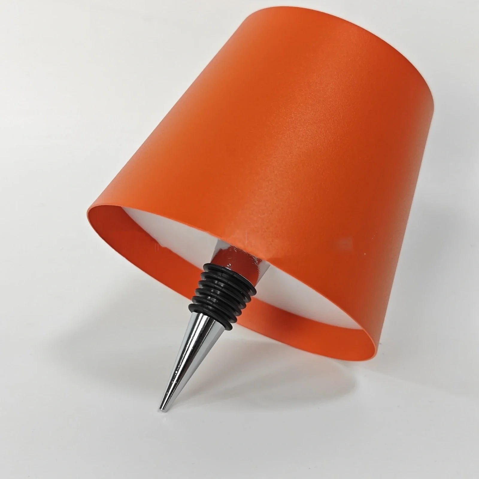 Wireless LED desk lamp in black tricolour finish, bottle-shaped with detachable base and touch control for 2000mAh powered lighting