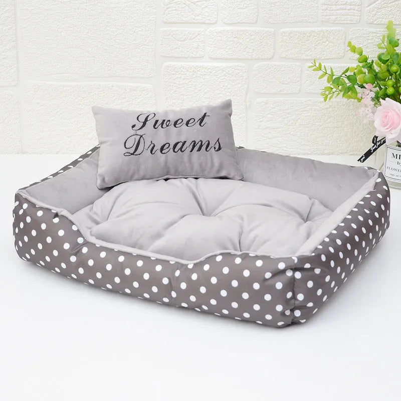 Polka dot print square nest dog bed for small dogs with a removable embroidery pillow in grey, blue, pink, or red.