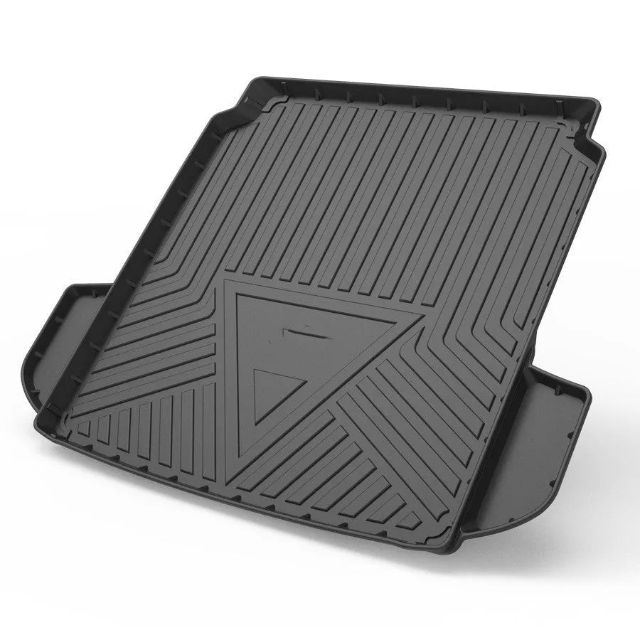 Black carbon fibre pattern tailored car boot liner mat fitted in an estate vehicle