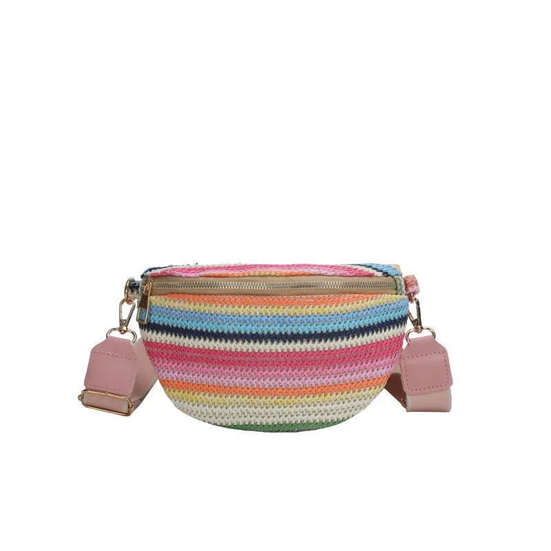 Blue and pink woven straw beach bag with single shoulder strap and zipper compartment