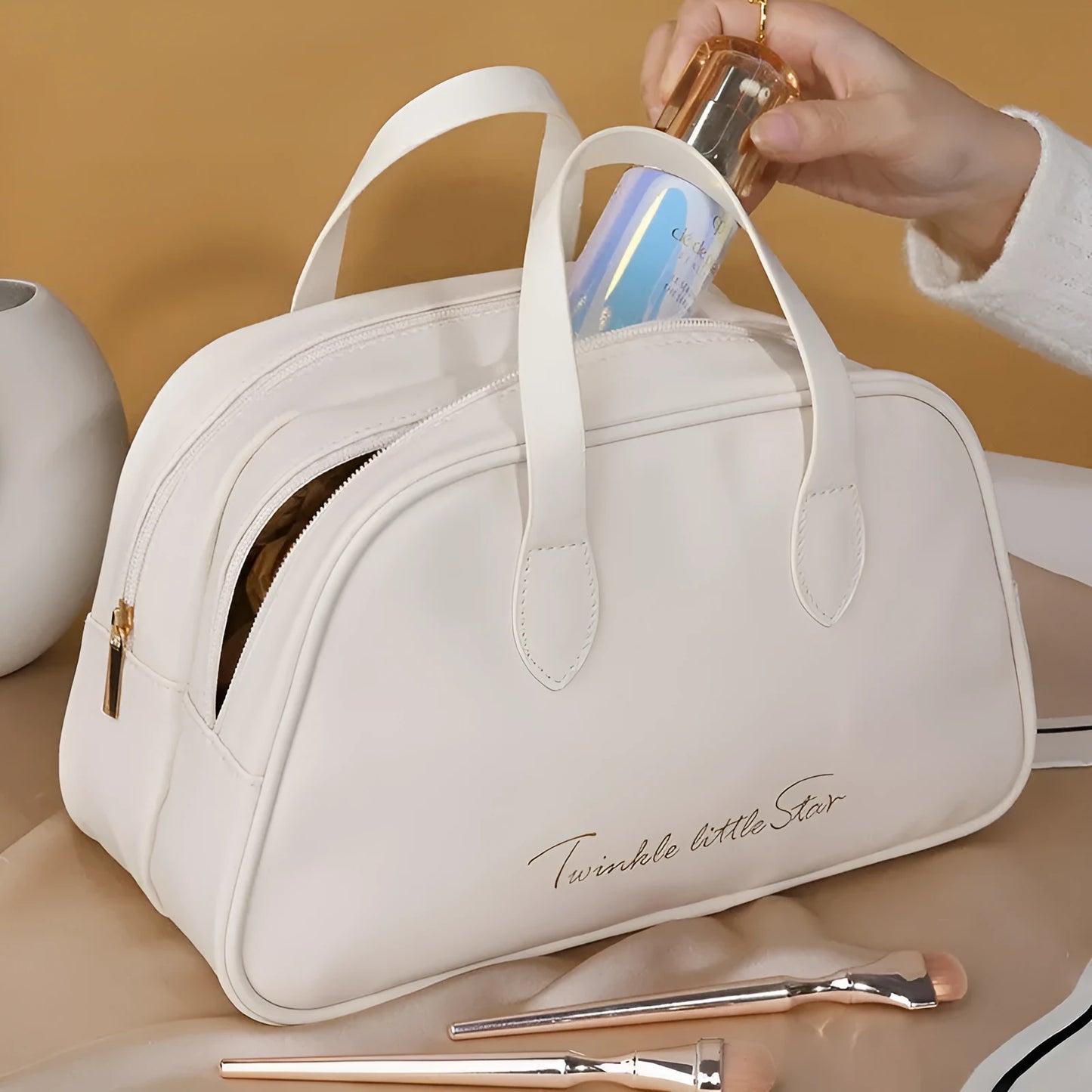 Leather travel toiletry bag with dry-wet separation compartments in caramel mocha colour