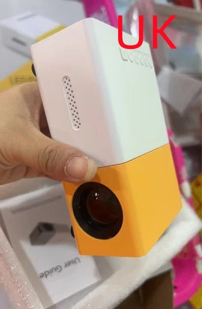 Compact 1080p HD home cinema projector with versatile connectivity and adjustable display settings