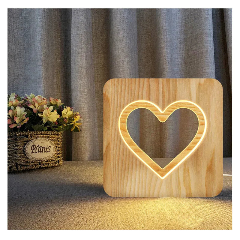 Solid wood hollow night lamp with warm white LED light showing wooden construction and compact dimensions