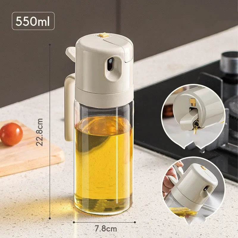 Warm grey glass oil sprayer bottle with a switchable nozzle for spray or pour modes.