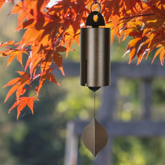 Elegant iron wind chimes in black and brown colors, designed for decorative garden and outdoor use