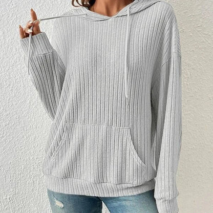 A stylish and comfortable hooded sweatshirt with drawstring and pockets, available in various colors.