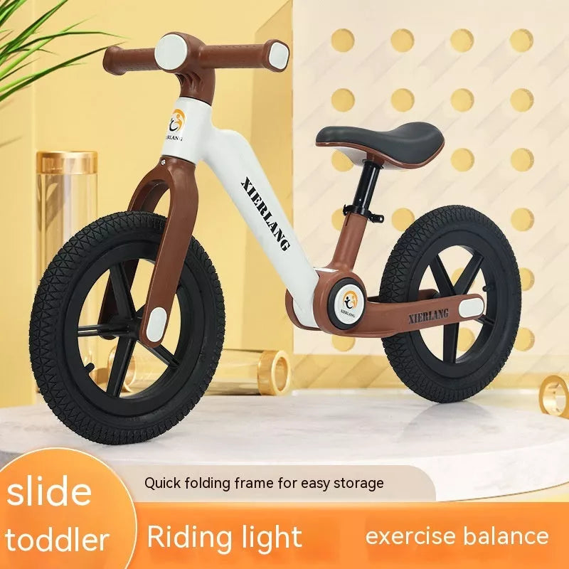 Foldable kids balance bike in grass green, light brown, or pink purple