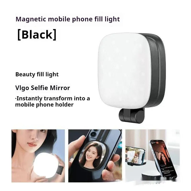 Black and white mini mobile phone fill light with magnetic holder attached to a smartphone
