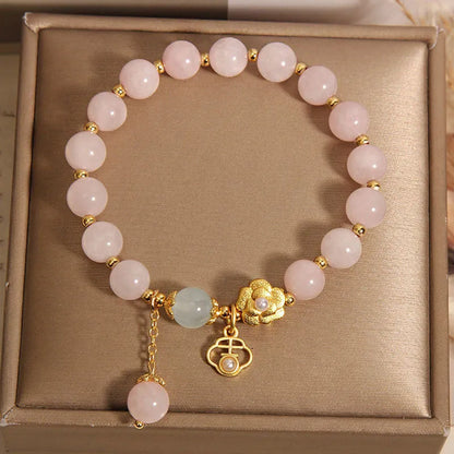 Women's pink crystal flower bracelet with adjustable sizing and refined grace floral design