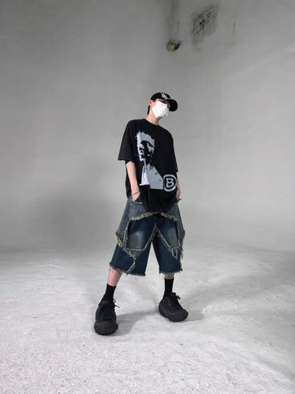 Blue men's denim shorts with frayed hem, loose fit, and a white five-pointed star patch on the leg.