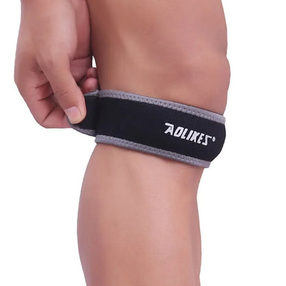 Black and grey patella retinaculum knee support for sports like running and football