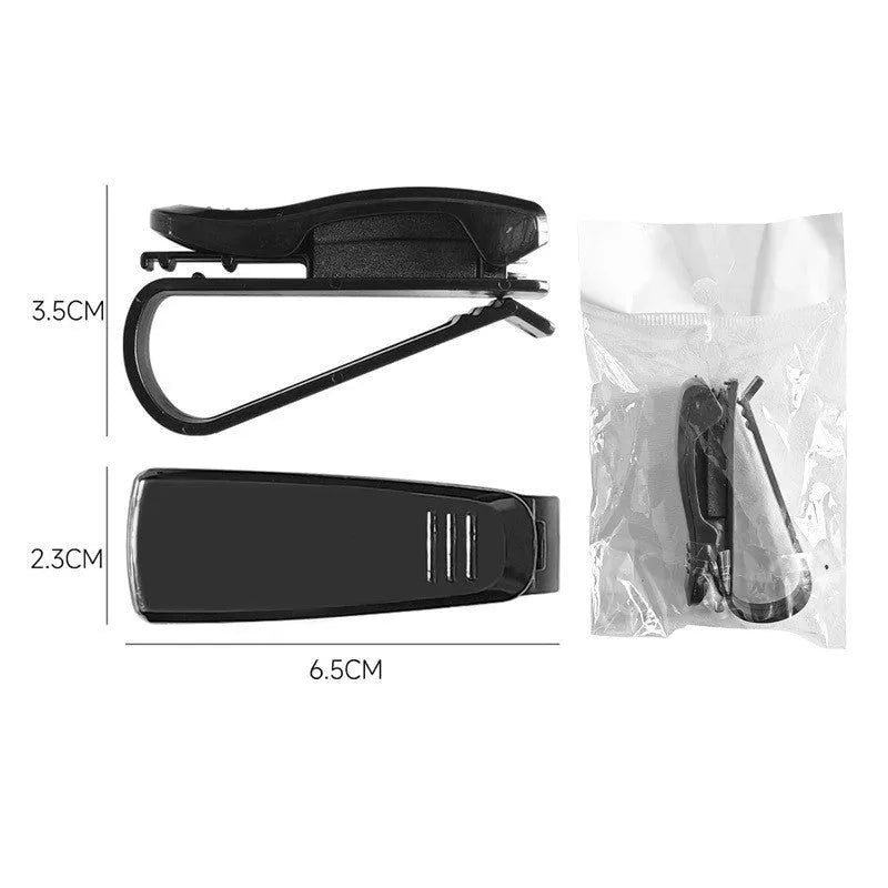 Black plastic clip for car sunshades to hold tickets, ID cards, or glasses.