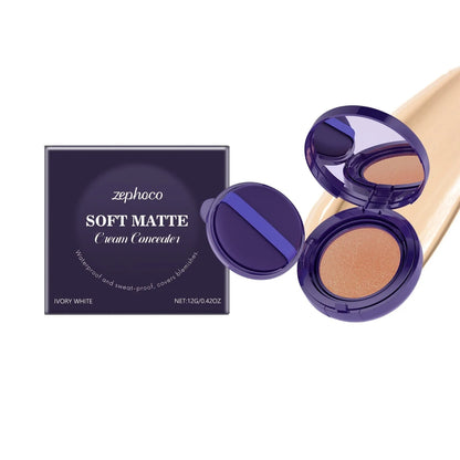 Soft matte cream concealer compact in Ivory White shade with air cushion applicator.