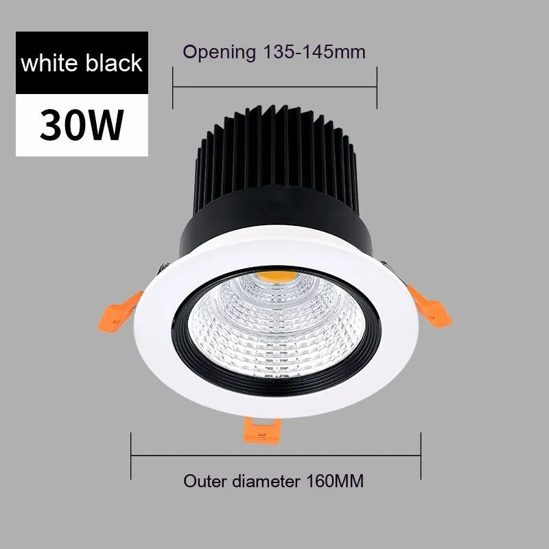 Modern aluminium recessed LED ceiling spotlight with three colour temperature settings shown installed.