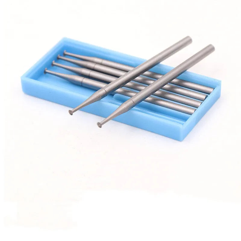 Blue box containing six tungsten steel carving milling cutter grinding heads with thin disc needle shapes and 2.35mm mandrels.