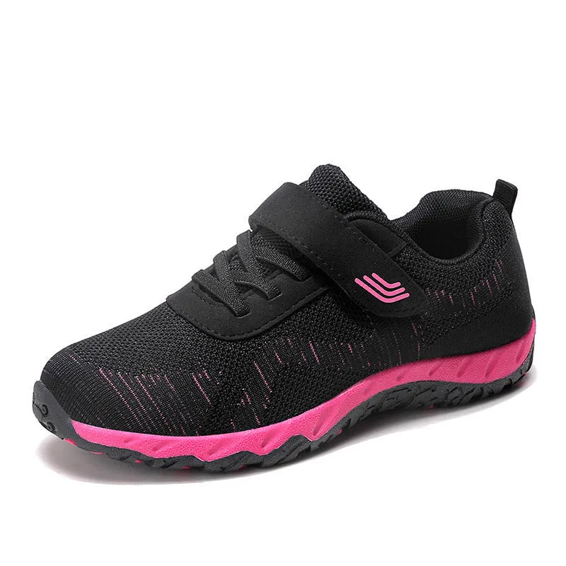 Women's gray purple casual shoes with mesh upper, wedge heel, and Velcro strap.