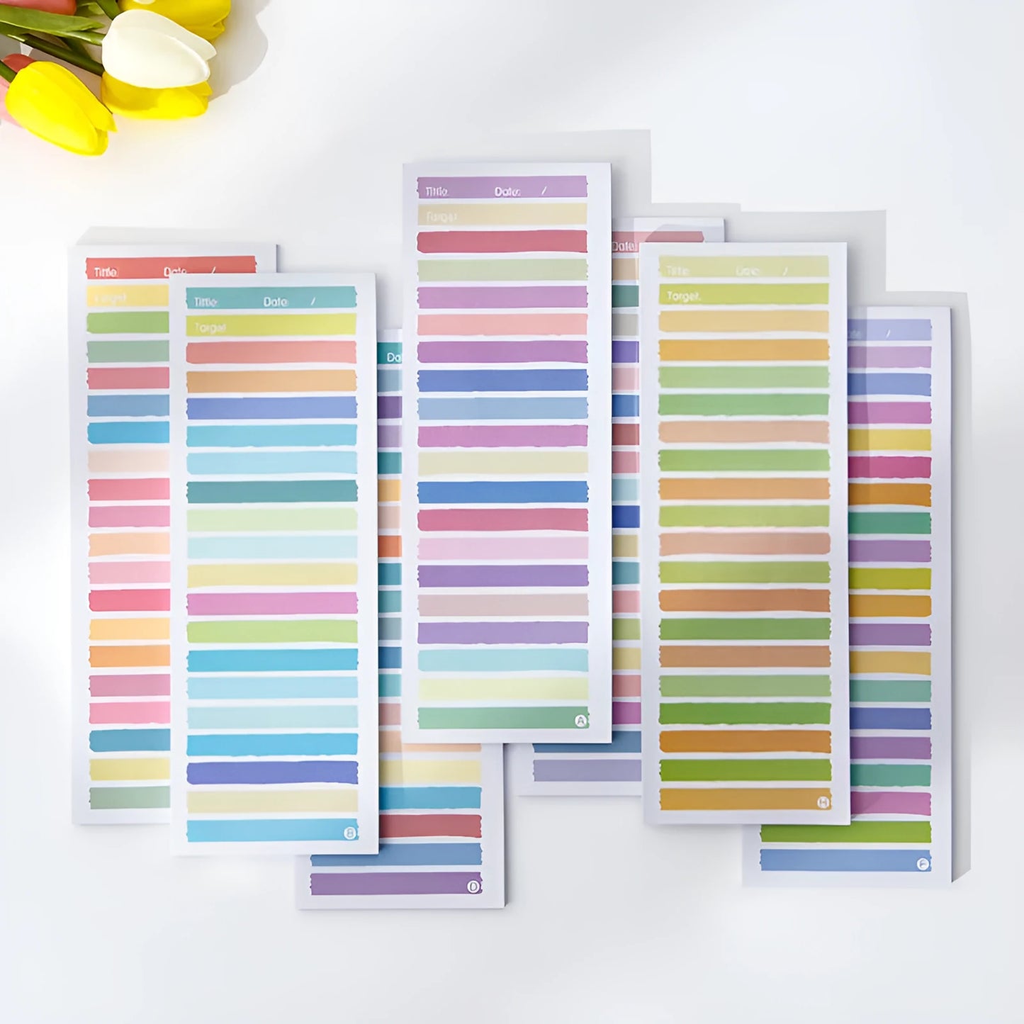 Student notepad with sticky notes in plastic box, showing cartoon bear or bunny cover designs