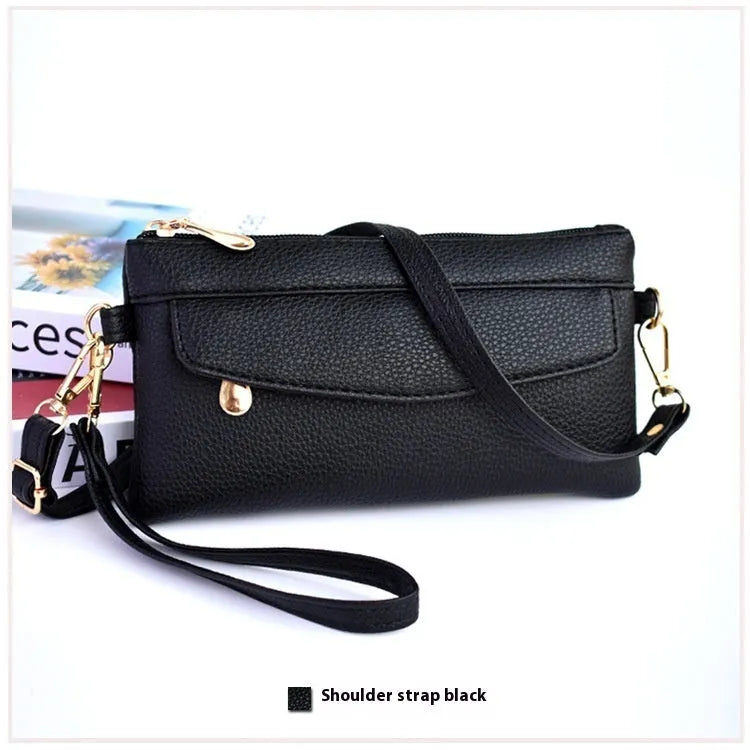 Soft surface square PU crossbody bag and clutch with internal zipper pocket in various colours.