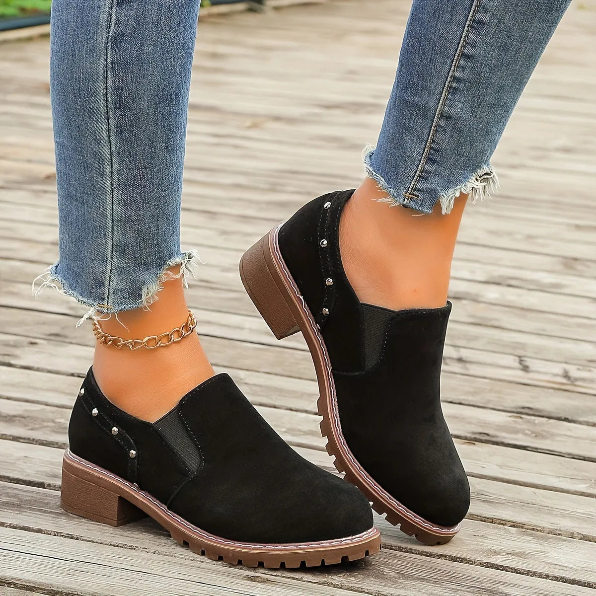 Light brown plus size women's suede ankle boot with low thick heel and elastic band detail.