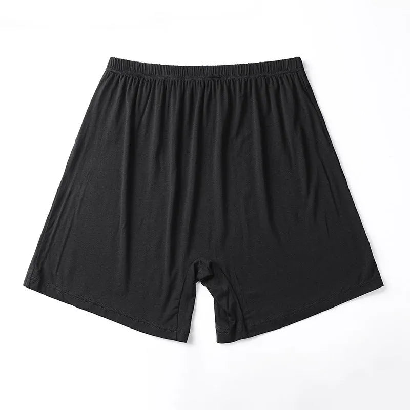 Men's solid colour high-waist boxers in modal fabric laid flat.