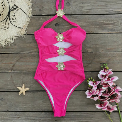 Solid colour women's one-piece swimsuit with attached short skirt and strapless hollow-out tube top design.