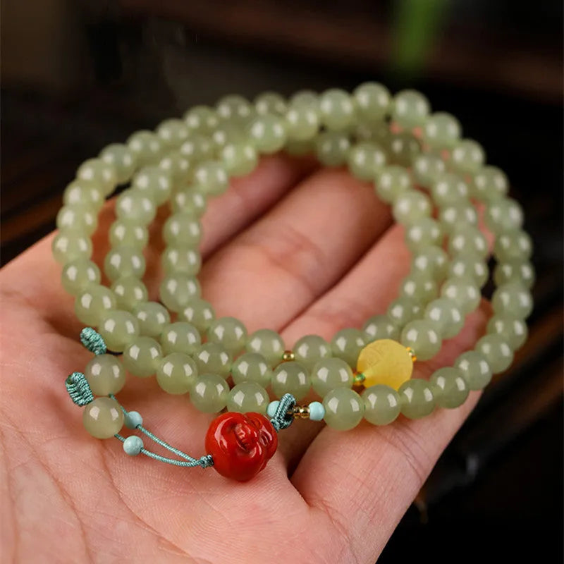 Pale blue Hetian jade bracelet with 6mm beads in three-circle design