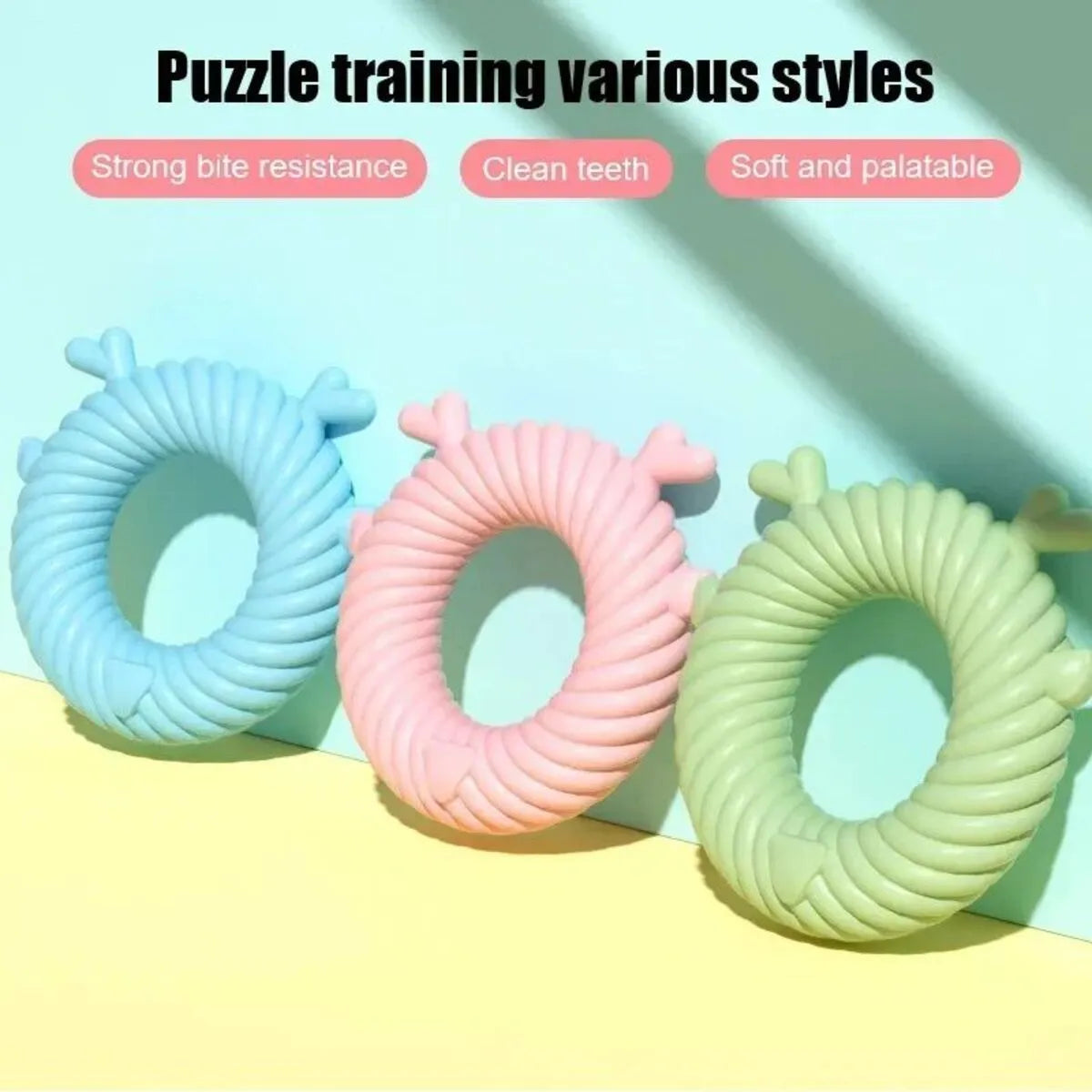 Deer-shaped dog chew toy with spiral grooves in light blue, pink, or green colours