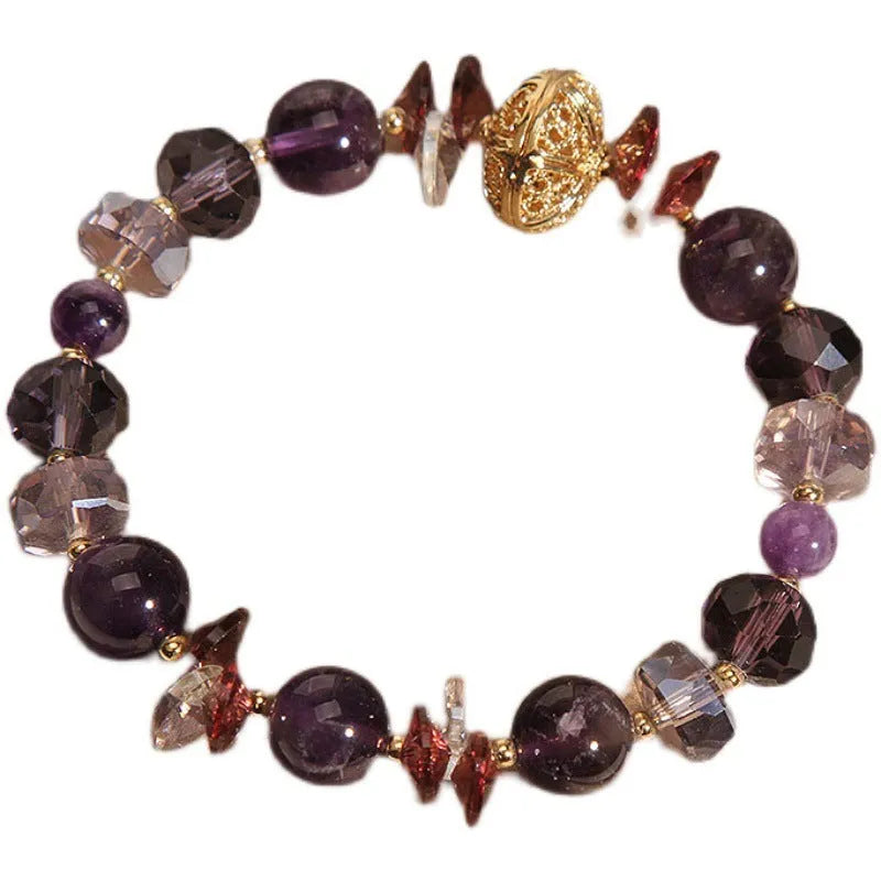 Purple crystal bracelet with pumpkin beads and rhinestone decoration